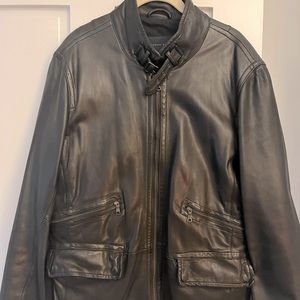 Black leather biker-style jacket. Soft leather. Beautiful condition.